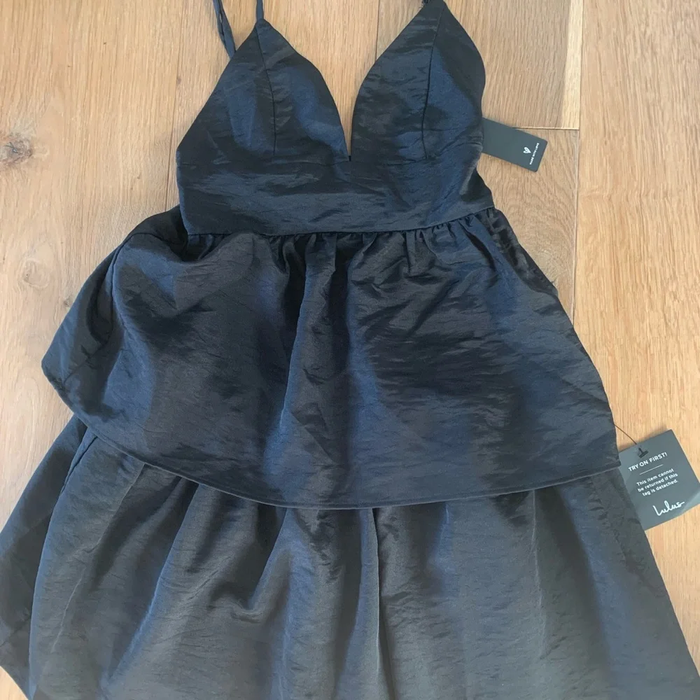 New With Tags! Lulu’s little black dress XS Party Pose Satin tiered min dress. - Picture 3 of 7